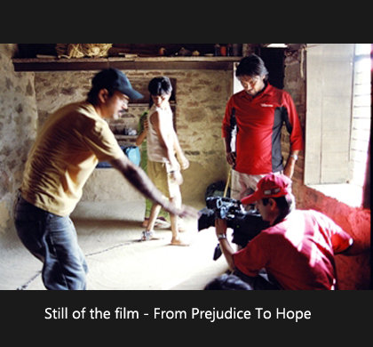 A still from the film "From Prejudice to Hope," capturing a moment of emotional depth and visual storytelling.